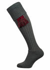 Knee high knitted socks in dark green with optional garter tie in burgundy and bracken.