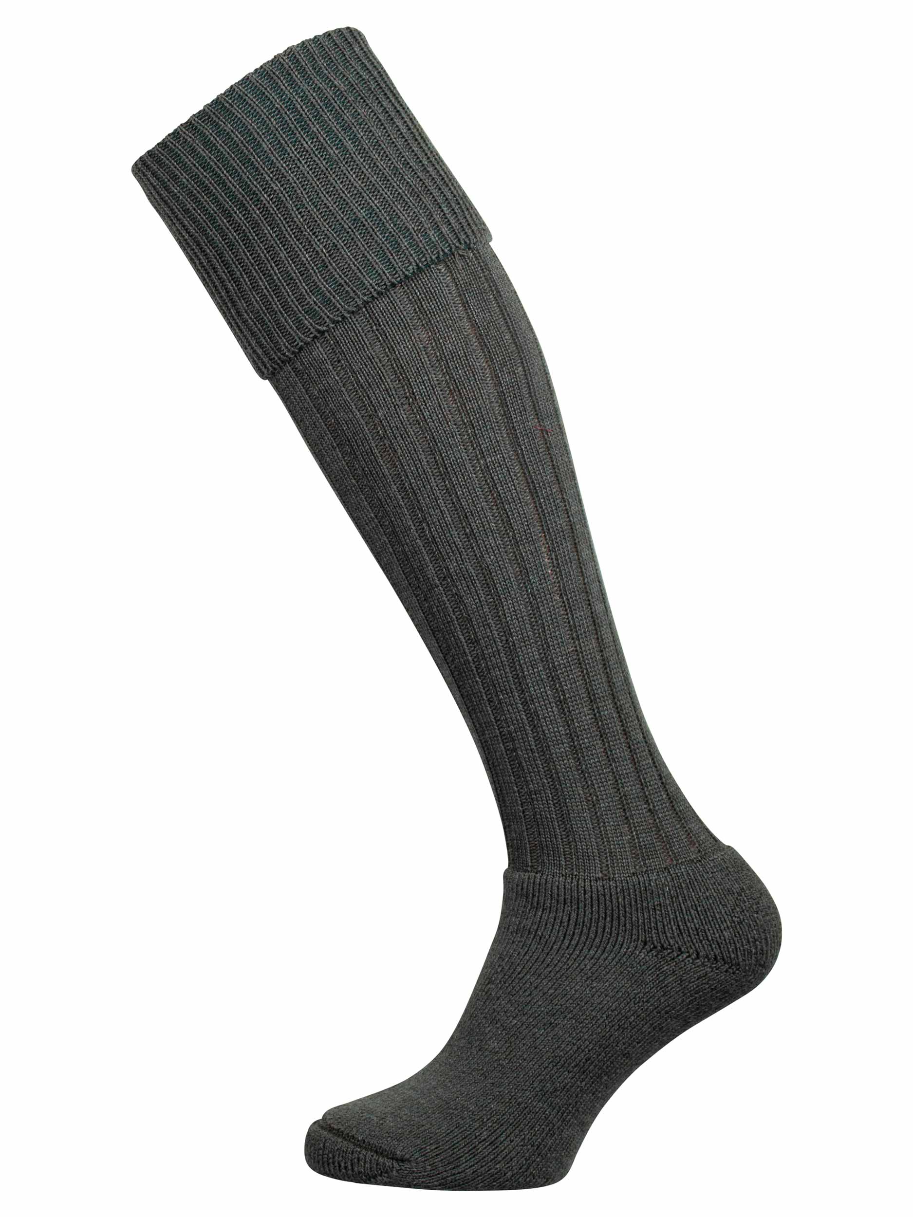 Knee high knitted socks in dark green.