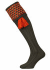 Merino wool shooting sock in deep hunter green with burnt orange and camel pattern - optional orange garters.