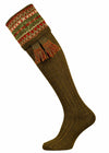 A classic fairisle knit pattern on a ribbed leg makes this shooting sock in deep green a refined choice.