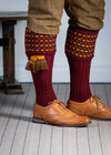 Long knitted shooting socks in burgundy with a ribbed leg, features 2 different colours in the textured knit top