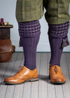 Long knitted shooting socks in purple with a ribbed leg, features 2 different colours in the textured knit top
