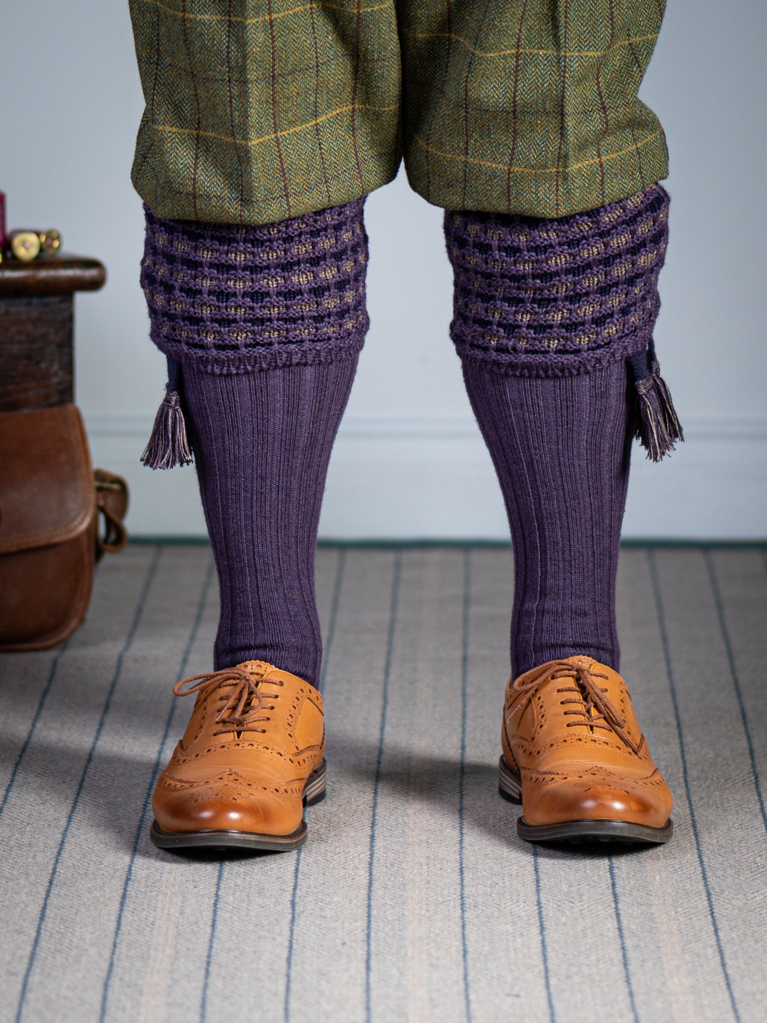 Long knitted shooting socks in purple with a ribbed leg, features 2 different colours in the textured knit top
